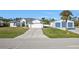 Single Gathering home with a detached garage and a long driveway at 17152 Wintergarden Ave, Port Charlotte, FL 33948