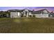 Beautiful one-story home with a large yard and attached garage at 17152 Wintergarden Ave, Port Charlotte, FL 33948