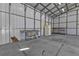 Spacious workshop with sink and shelving at 17152 Wintergarden Ave, Port Charlotte, FL 33948
