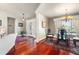 Formal dining room with hardwood floors and a glass-top table at 240 Divinci Dr, Punta Gorda, FL 33950