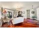 Elegant living room with hardwood floors and access to a backyard patio at 240 Divinci Dr, Punta Gorda, FL 33950