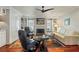 Spacious living area features hardwood floors, comfortable seating, and a cozy fireplace at 240 Divinci Dr, Punta Gorda, FL 33950