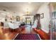 Living room with hardwood floors, access to the backyard, and a chandelier at 240 Divinci Dr, Punta Gorda, FL 33950