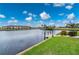 Scenic view of the canal with lush green landscaping at 1457 Sea Fan Dr, Punta Gorda, FL 33950