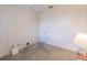 Bright bedroom with neutral walls, carpet flooring, and ample closet space at 2970 Royal Palm Dr, North Port, FL 34288