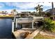 Private boat dock with a lift for convenient access to the water at 3600 Aruba Ct, Punta Gorda, FL 33950