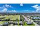 Aerial view showcasing a neighborhood with water views and lush greenery at 3783 Pebble Ter, Punta Gorda, FL 33980