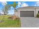 Two-car garage with paver driveway at 8883 Saint Kitts Cir, Englewood, FL 34224