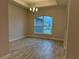 Bright dining room with tile floors and an arched window at 10225 Winnipeg St, Port Charlotte, FL 33981