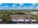 Aerial view highlighting condo building and parking at 19310 Water Oak Dr # 201, Port Charlotte, FL 33948