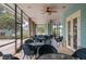 Covered patio with wicker furniture for relaxing at 19310 Water Oak Dr # 201, Port Charlotte, FL 33948