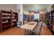 Community library with bookshelves and seating at 19310 Water Oak Dr # 201, Port Charlotte, FL 33948