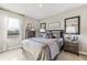 Relaxing bedroom with neutral decor, full-size bed, and ample closet space at 5096 Schubert Trl, North Port, FL 34287