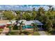 Aerial view of a teal house and neighborhood at 350 Gill St, Punta Gorda, FL 33950