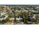 Aerial view of a single-Gathering home nestled in a residential neighborhood at 350 Gill St, Punta Gorda, FL 33950