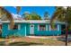 Teal single story house with white shutters at 350 Gill St, Punta Gorda, FL 33950