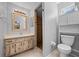 Clean bathroom with a walk-in shower and updated vanity at 1327 Abscott St, Port Charlotte, FL 33952
