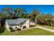 Single-story home with landscaped yard and driveway at 1327 Abscott St, Port Charlotte, FL 33952