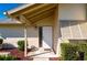 Inviting front entrance with a covered porch and landscaping at 1327 Abscott St, Port Charlotte, FL 33952