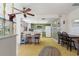 The retro kitchen opens up to a bar with seating and also contains a dining nook at 2501 Rio Largo Ct, Punta Gorda, FL 33950