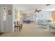 Open-concept living room with terrazzo floors and plenty of natural light, perfect for entertaining at 2501 Rio Largo Ct, Punta Gorda, FL 33950