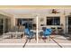 View of a large open-air patio with ceiling fans, seating and a serving bar at 2501 Rio Largo Ct, Punta Gorda, FL 33950