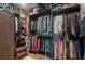 Large walk-in closet with ample hanging space and shelving at 5117 Collingswood Blvd, Port Charlotte, FL 33948