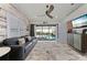 Relaxing Gathering room with pool view and sliding doors at 5117 Collingswood Blvd, Port Charlotte, FL 33948