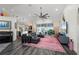 Spacious living room with sectional sofa, large TV, and water view at 5117 Collingswood Blvd, Port Charlotte, FL 33948