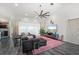 Spacious living room with sectional sofa, large TV, and water view at 5117 Collingswood Blvd, Port Charlotte, FL 33948