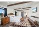 Large main bedroom with sliding barn door and ensuite bath access at 5117 Collingswood Blvd, Port Charlotte, FL 33948
