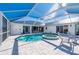 Enjoy this refreshing pool and spa with a covered patio at 5117 Collingswood Blvd, Port Charlotte, FL 33948