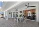 Covered patio with dining area and pool access at 5117 Collingswood Blvd, Port Charlotte, FL 33948