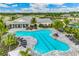Aerial view showing the community pool and clubhouse at 16114 Highgate St, Port Charlotte, FL 33953