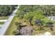 Wide shot of property showing road and surrounding area at 14454 Nw Chamberlain Blvd, Port Charlotte, FL 33953