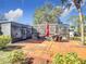 Large backyard with patio and grill area at 14454 Nw Chamberlain Blvd, Port Charlotte, FL 33953