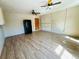 Kitchen area with refrigerator and tile floors at 14454 Nw Chamberlain Blvd, Port Charlotte, FL 33953