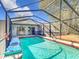 Refreshing screened pool perfect for relaxation at 14454 Nw Chamberlain Blvd, Port Charlotte, FL 33953