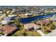 Aerial view showcasing a house's location in a waterfront community at 831 Via Tunis, Punta Gorda, FL 33950