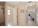 Well-lit hallway bathroom with toilet and shower at 831 Via Tunis, Punta Gorda, FL 33950