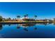 Stunning waterfront view with home reflections and blue skies at 831 Via Tunis, Punta Gorda, FL 33950