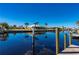 Waterfront property with serene canal views and palm trees at 831 Via Tunis, Punta Gorda, FL 33950