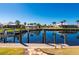 Scenic view of a canal with waterfront homes and lush landscaping at 831 Via Tunis, Punta Gorda, FL 33950