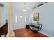 Light and bright entryway with hardwood floors and decorative console table at 831 Via Tunis, Punta Gorda, FL 33950