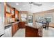 Spacious kitchen featuring granite countertops, modern appliances, and ample cabinetry at 831 Via Tunis, Punta Gorda, FL 33950