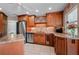 Kitchen with stainless steel appliances and an island at 831 Via Tunis, Punta Gorda, FL 33950