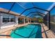 Spacious pool and patio area with screened enclosure at 831 Via Tunis, Punta Gorda, FL 33950