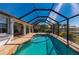 Inviting screened-in pool and patio area at 831 Via Tunis, Punta Gorda, FL 33950