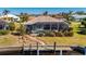 Private screened pool and dock overlooking the canal at 831 Via Tunis, Punta Gorda, FL 33950