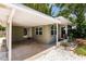 Carport attached to the home providing covered parking at 2112 Mark Ave, Punta Gorda, FL 33950